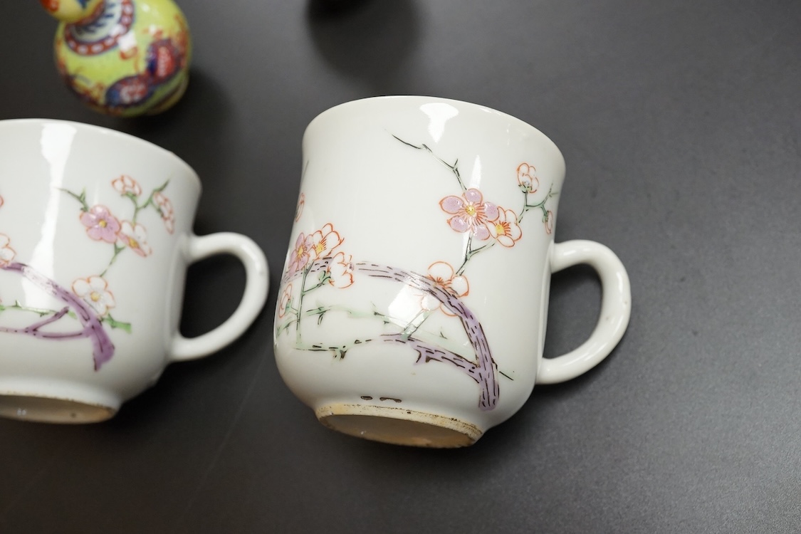Two Chinese famille rose cups, Yongzheng period and two miniature clobbered vases, largest 6cm high